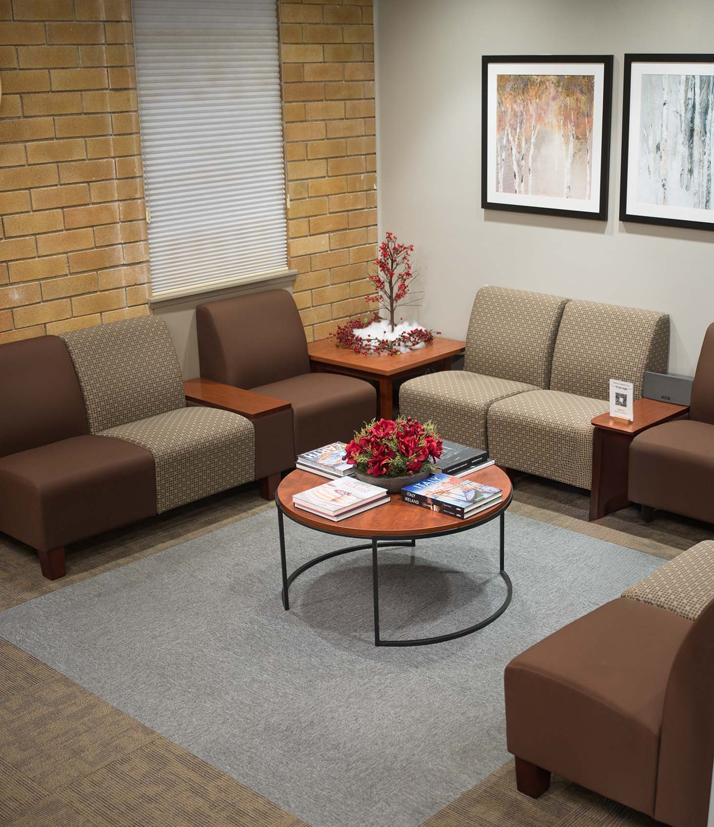 Sound Injury waiting room with comfortable seating and art